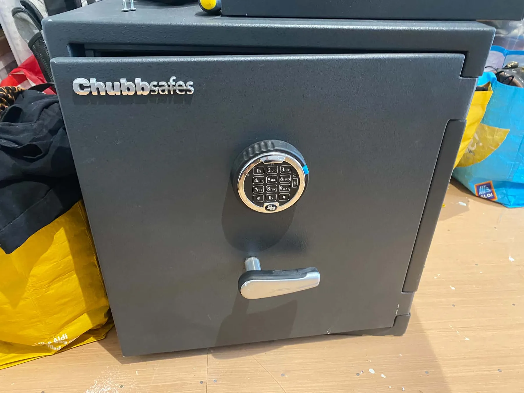 A modern Chubb safe with an electronic combination lock